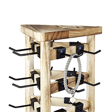Upper part of wooden rotating display rack with metal hooks