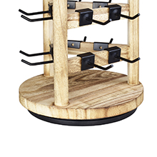 lower part of wooden rotating jewelry display rack with metal hooks showing rotating base
